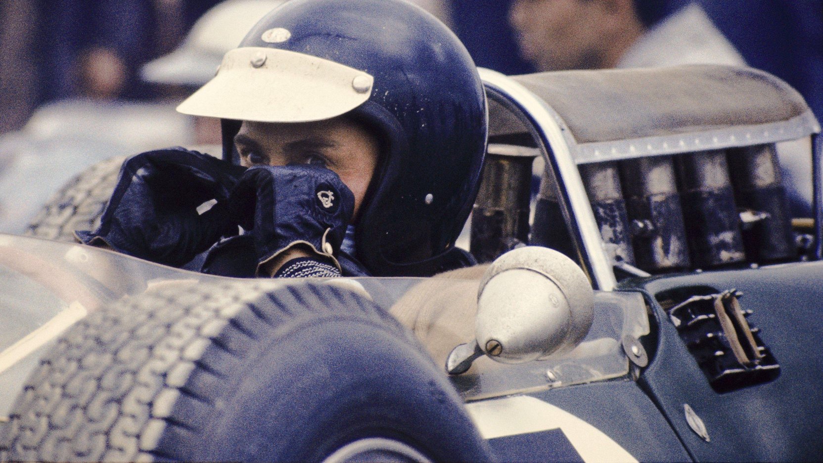A close-up of Jim Clark's eyes sat in his Lotus at Watkins Glen in 1965