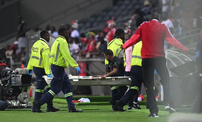 Oswin Appollis of Orlando Pirates was stretchered off during the Betway Premiership match against TS Galaxy FC at Orlando Amstel Arena. 