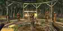 Treeminders from Fallout 3 standing in a circle around a tree stump. 