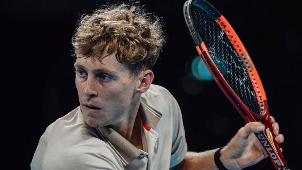 Felix Balshaw hits a backhand during the Lyon Open