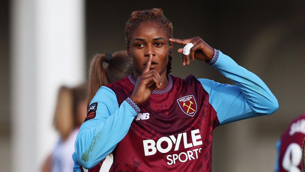West Ham's Kelly Gago celebrates scoring against Crystal Palace by putting her finger to her lips and pointing to the side of her head