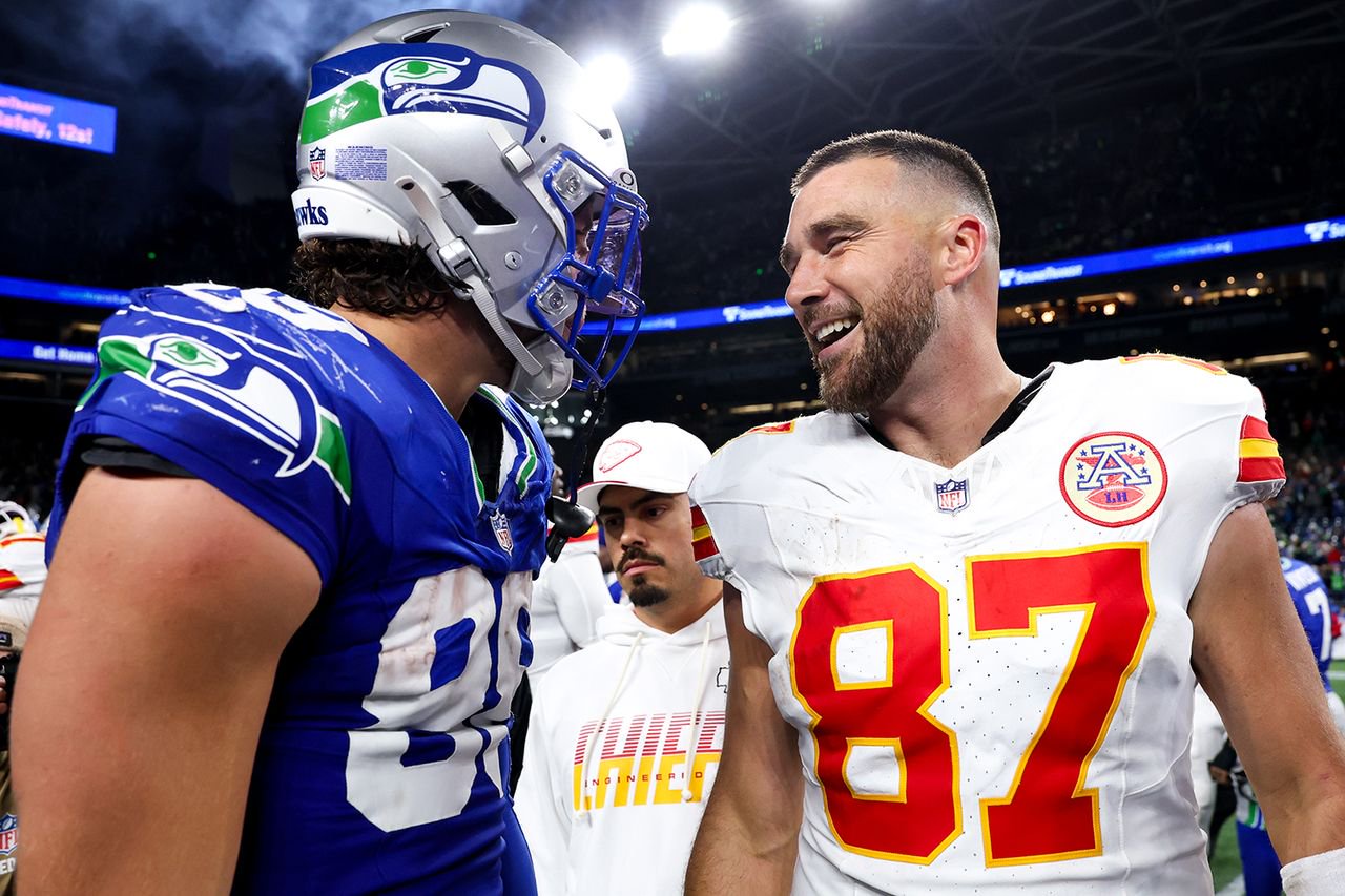 Travis Kelce #87 of the Kansas City Chiefs speaks with AJ Barner #88 of the Seattle Seahawks after the game on Sunday, Oct. 25. 2026.Credit: Caleb Bowlin/Getty