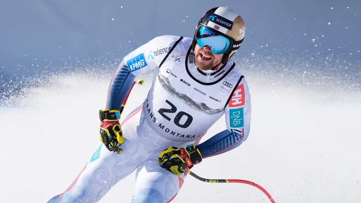 Norway's Aleksander Aamodt Kilde checks his time at the finish area of an alpine ski, men's World Cup downhill, in Crans Montana, Switzerland, Sunday, Feb. 1, 2026. (AP Photo/Giovanni Aulett ...