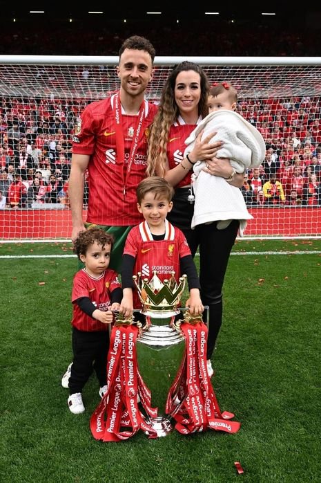 Diogo Jota with his wife Rute and their three young kids on the pitch