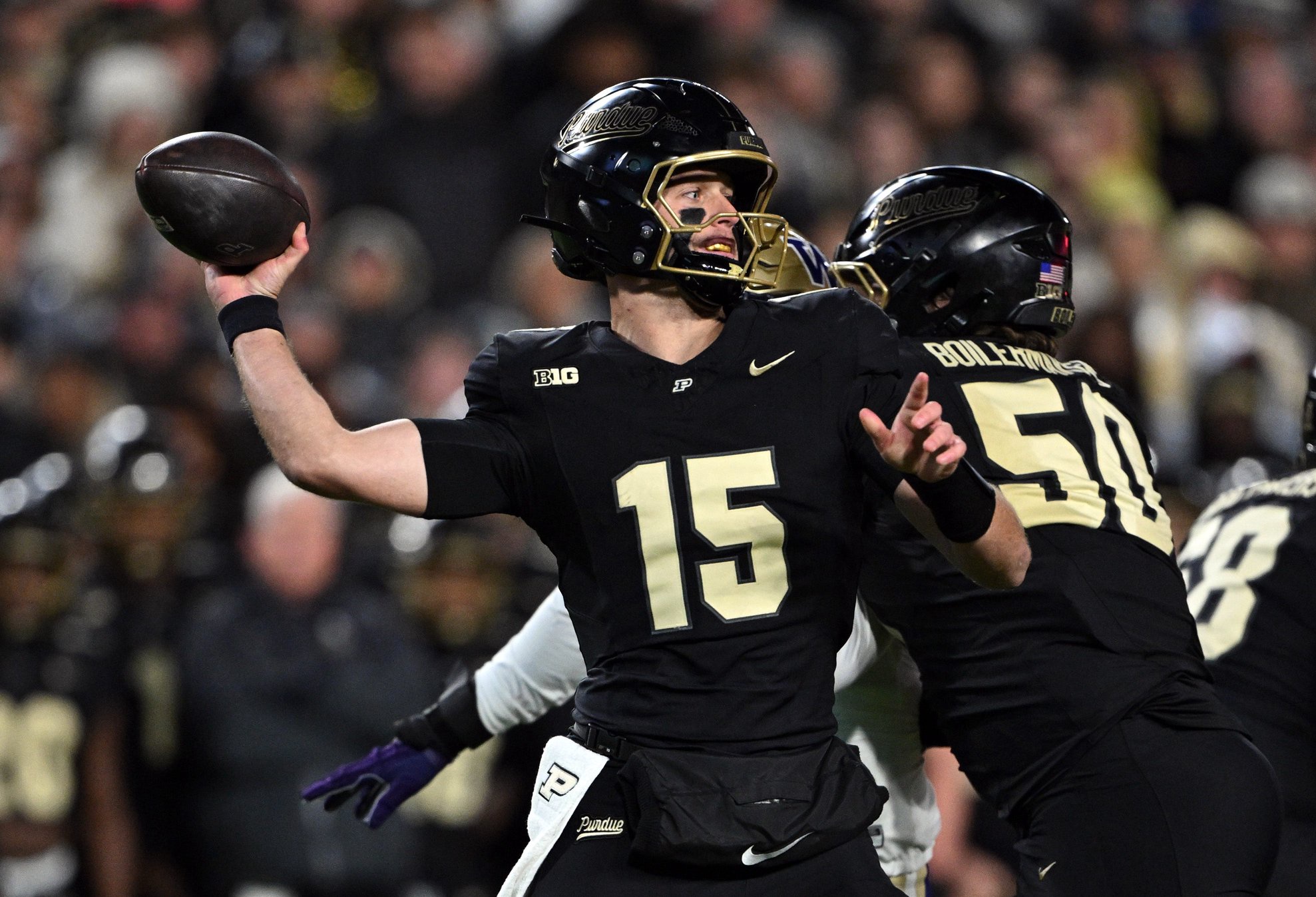 Purdue Boilermakers quarterback Ryan Browne (15) throws a pass during the second quarter against the Washington Huskies at Ross-Ade Stadium on Oct. 16, 2026.