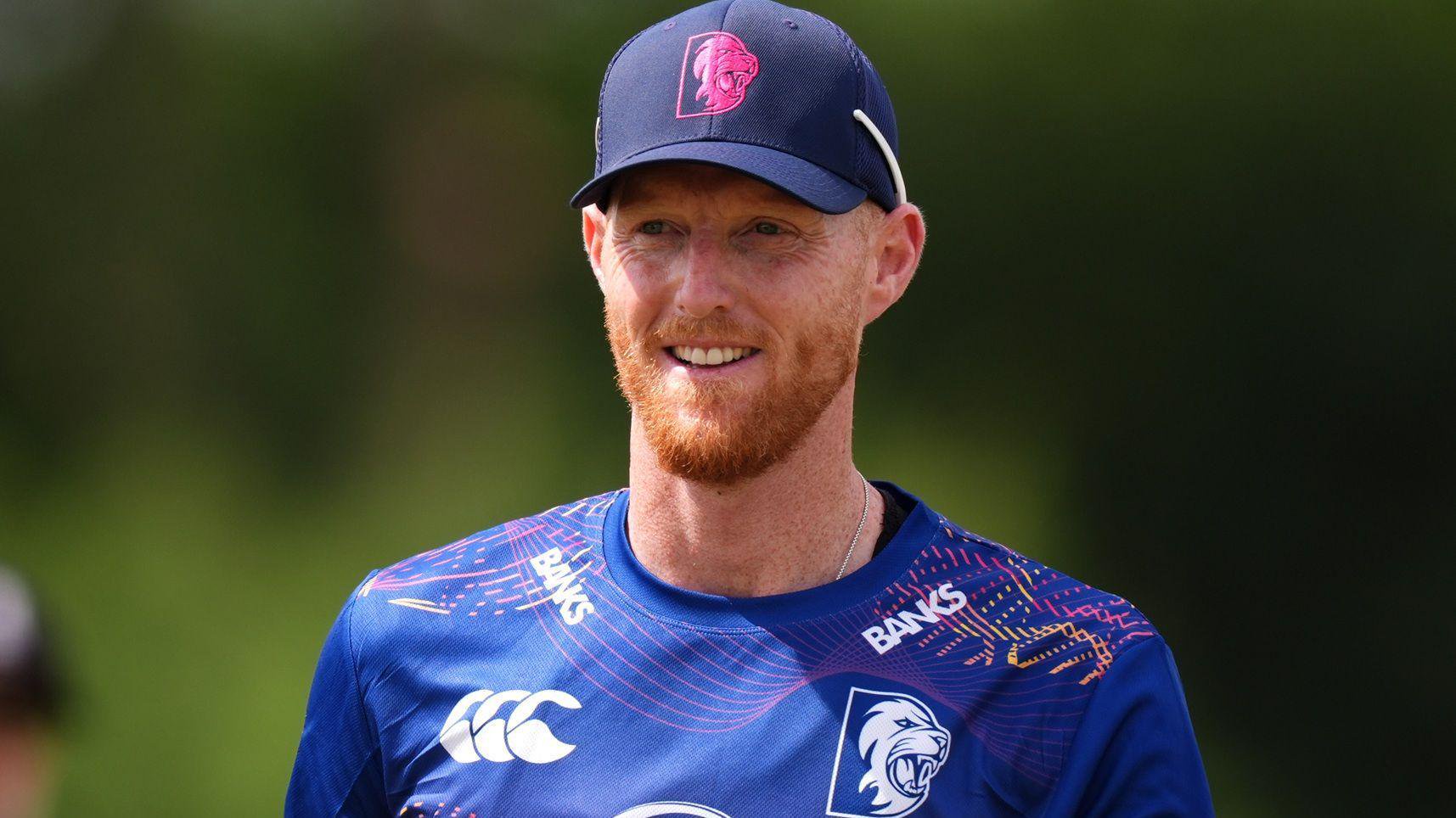 Ben Stokes holds his bat out in celebration as he hits a century against Derbyshire