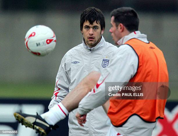 Liverpool united kingdom england footballers joe cole and jamie carragher take part in a
