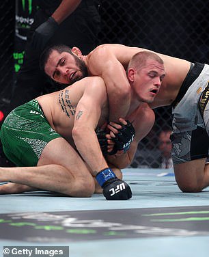 Pictured: Makhachev (top) fighting Irishman Ian Machado in August