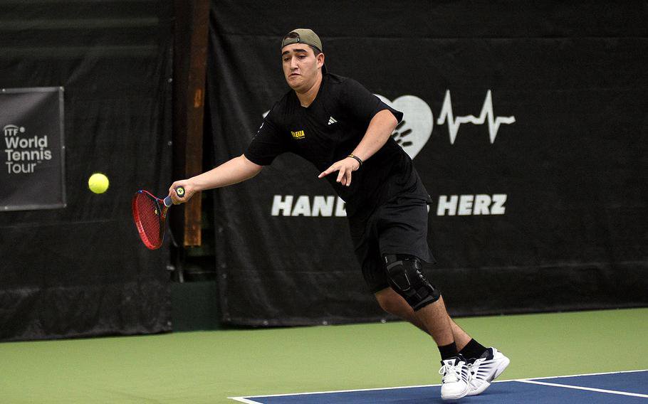 Michael Gillett reaches for the ball.