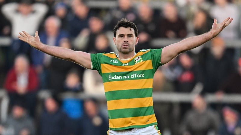 Darren McCurry of Edenork St.Malachy's protests the decision to award his score a regular point, which was later overturned to a 2-pointer, during the Tyrone County Senior Club Football Championship final match between Edendork St Malachy's and Errigal Ci