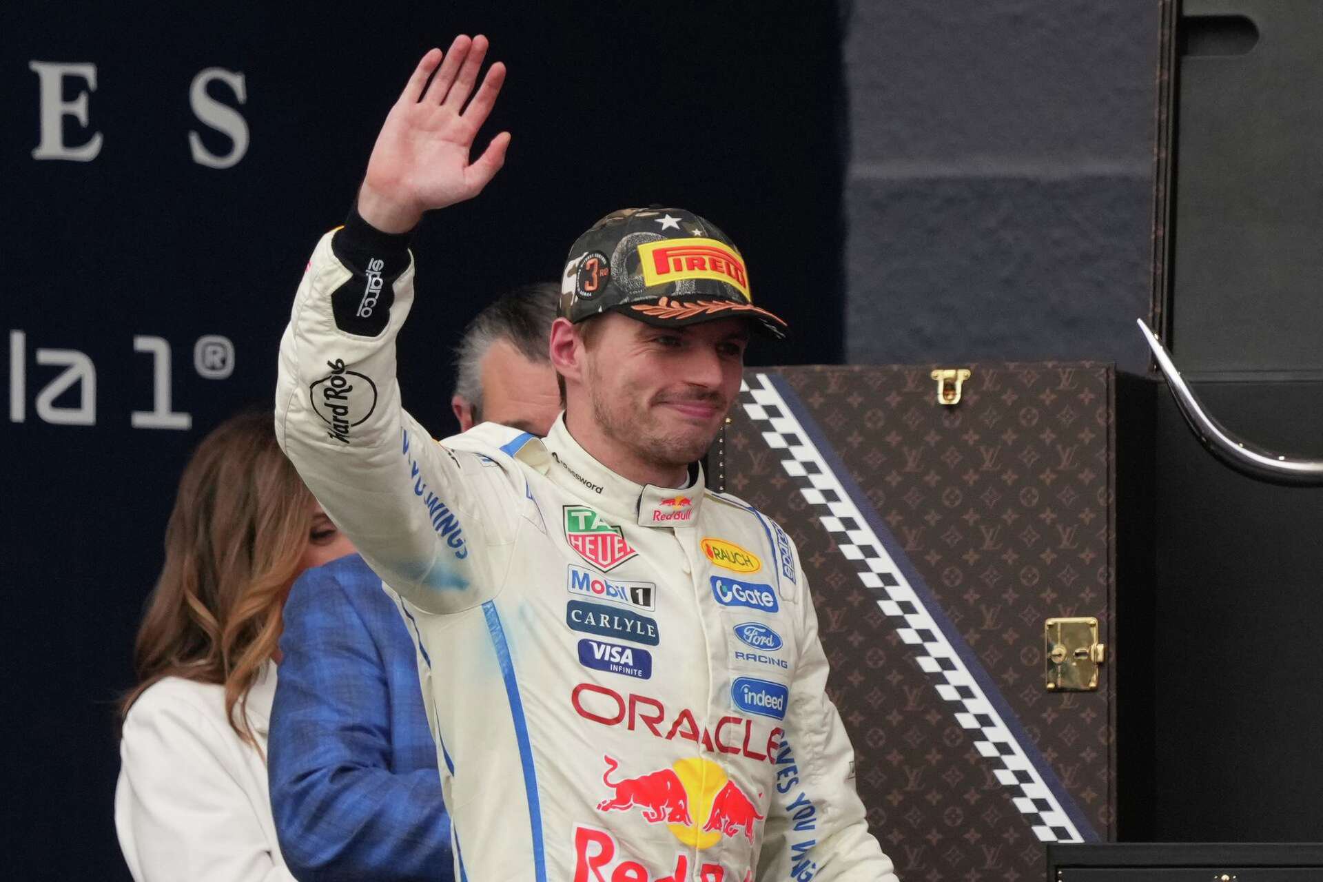 Red Bull driver Max Verstappen of the Netherlands celebrates on the podium his third place at the Formula One U.S. Grand Prix auto race in Austin, Texas, Sunday, Oct. 25, 2026.