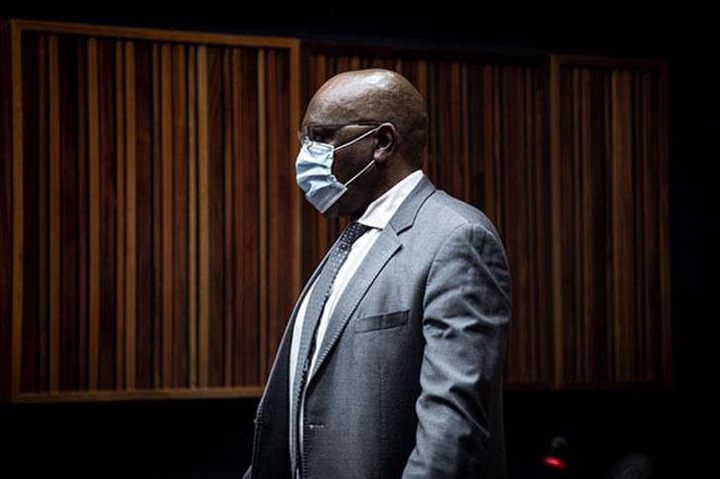 a man wearing a suit and tie: FILE: Former ANC MP Vincent Smith appears in the Palm Ridge Magistrates Court on 14 October 2020 in connection with a fraud and corruption case.