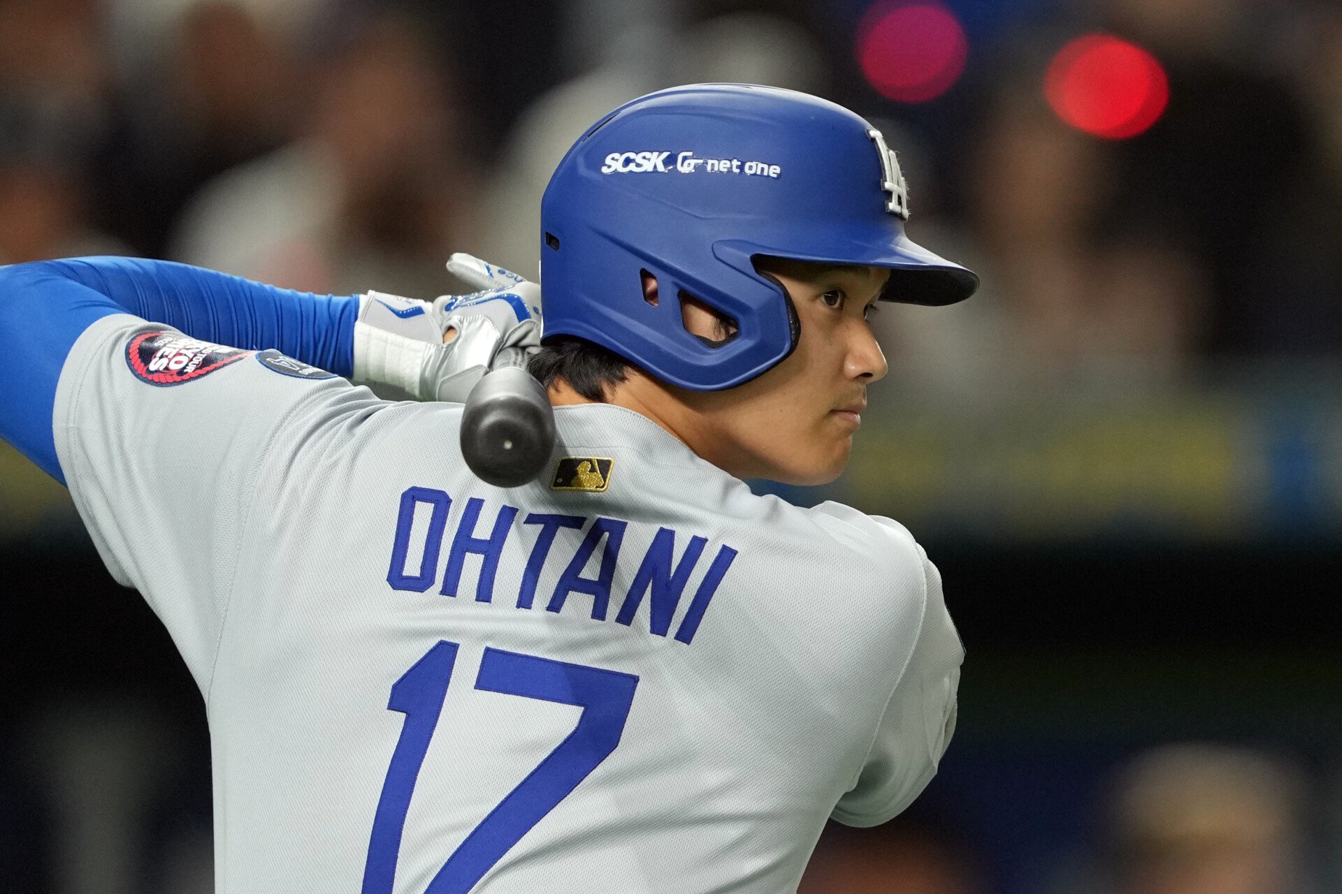 Mar 18, 2025; Bunkyo, Tokyo, JPN; Los Angeles Dodgers designated hitter Shohei Ohtani (17) prepares to bat during the first inning against the Chicago Cubs during the Tokyo Series at Tokyo Dome. Mandatory Credit: Darren Yamashita-Imagn Images