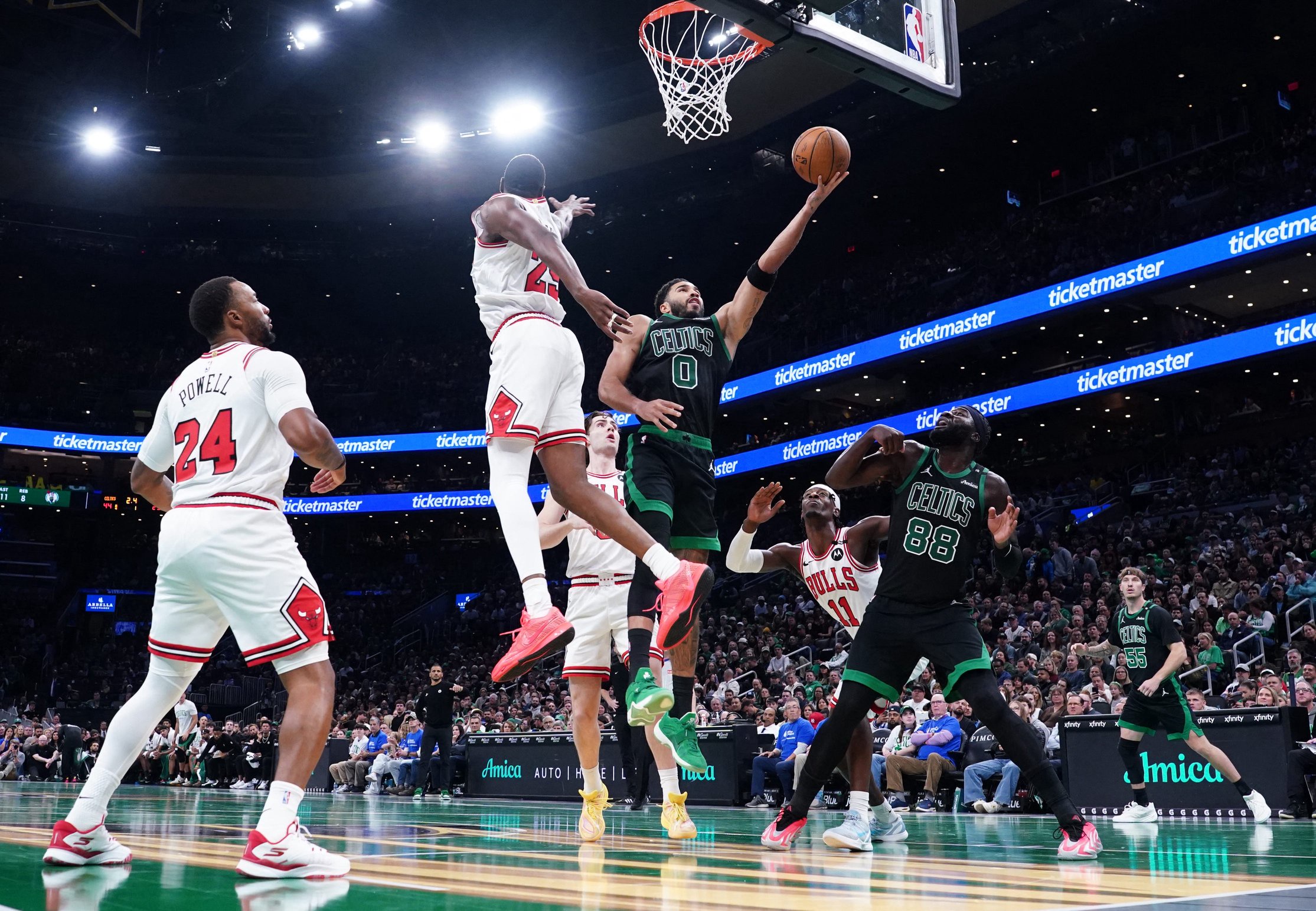 Oct 30, 2026; Boston, Massachusetts, USA; Boston Celtics forward Jayson Tatum (0) makes the basket against Chicago Bulls forward Jalen Smith (25) in the first quarter at TD Garden. Mandatory Credit: David Butler II-Imagn Images