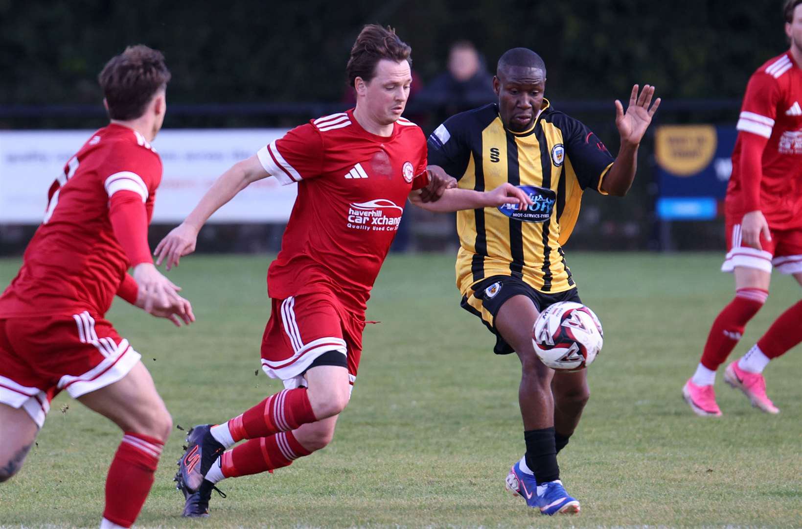 Haverhill Rovers captain Jarid Robson battles for possession against Stowmarket Town. Picture: Richard Marsham