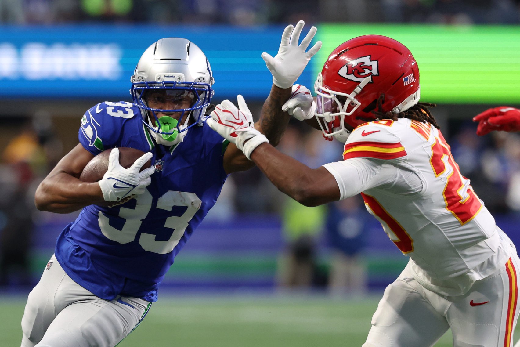 Oct 25, 2026; Seattle, Washington, USA;  Seattle Seahawks running back Velus Jones Jr. (33) carries the ball defended by Kansas City Chiefs defensive back Nohl Williams (20) during the second quarter at Lumen Field.  Mandatory Credit: Joe Nicholson-Imagn Images