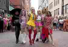 June 8, 2024; Columbus, Ohio, USA; 
Drag queens Miss Avarice, Maya Mortal, Blonde Vanity, Cloe Angel, Eden Apple and Godiva pose in Pearl Alley during the Downtown Pride festival Saturday evening.