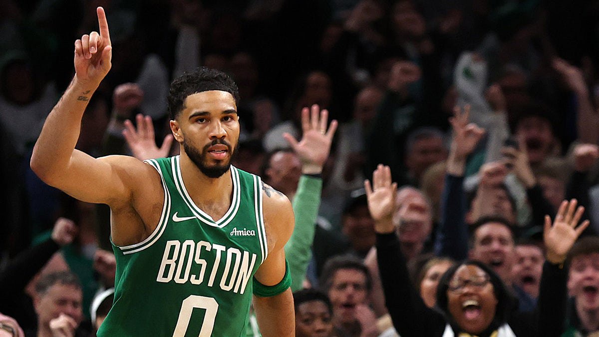 Jayson Tatum reacts during a game