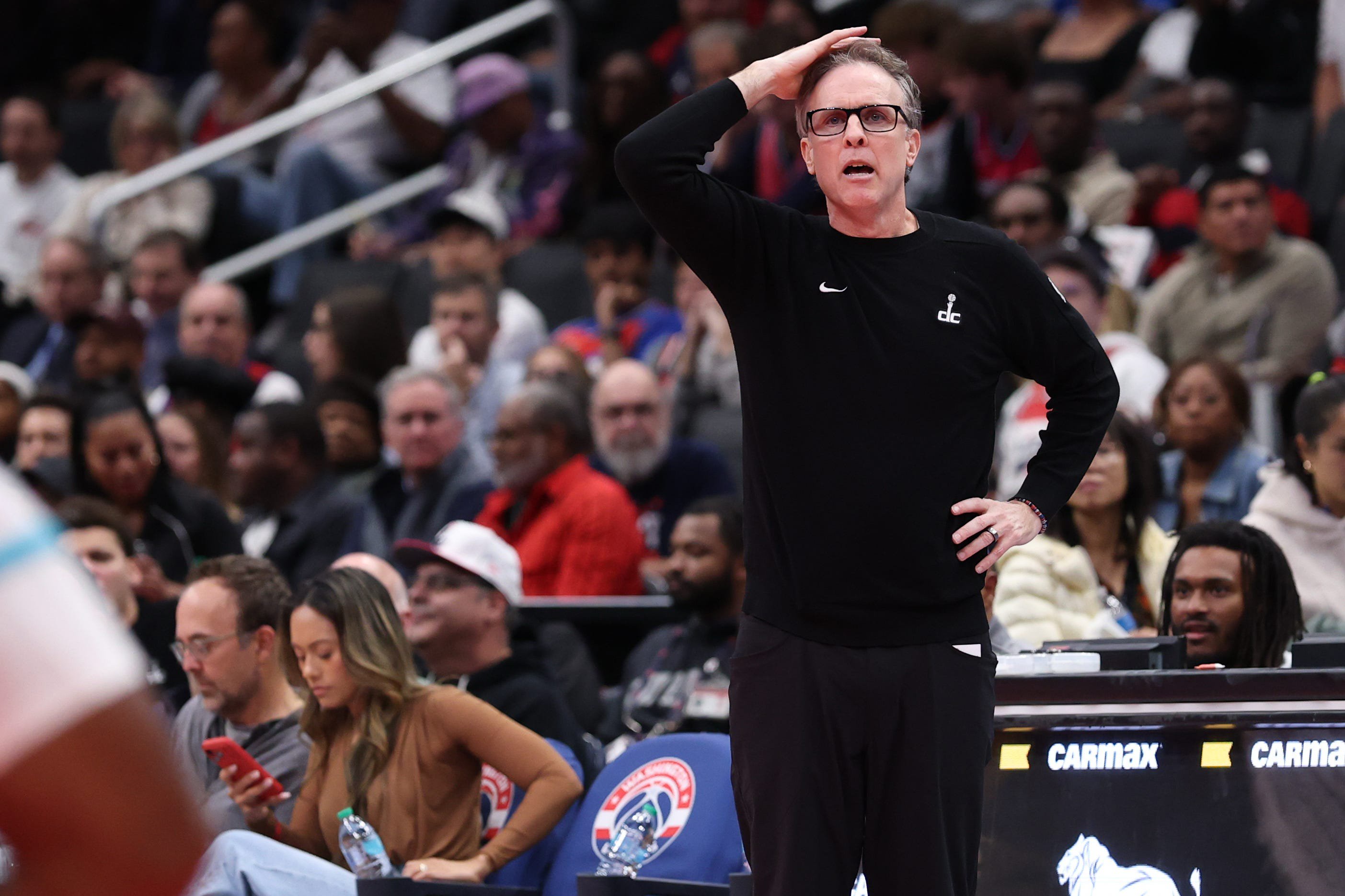Oct 30, 2026; Washington, District of Columbia, USA; Washington Wizards head coach Brian Keefe reacts on the bench against the Charlotte Hornets in the first half in an NBA Cup game at Capital One Arena. Mandatory Credit: Geoff Burke-Imagn Images