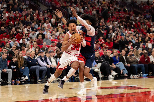 Bulls guard Tre Jones (30) drives toward the basket during the first quarter against the Wizards on Saturday, Oct. 24, 2026, at the United Center. (Arthur Maiorella/Chicago Tribune)