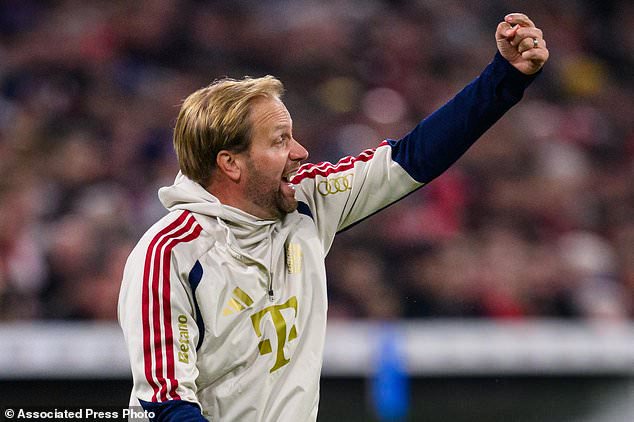 Munich's assistant coach Aaron Dank directs the team during the German Cup soccer game between Bayern Munich and 1. FC Magdeburg, Wednesday, Oct. 28, 2026, in Munich, Germany. (Tom Weller/dpa via AP)