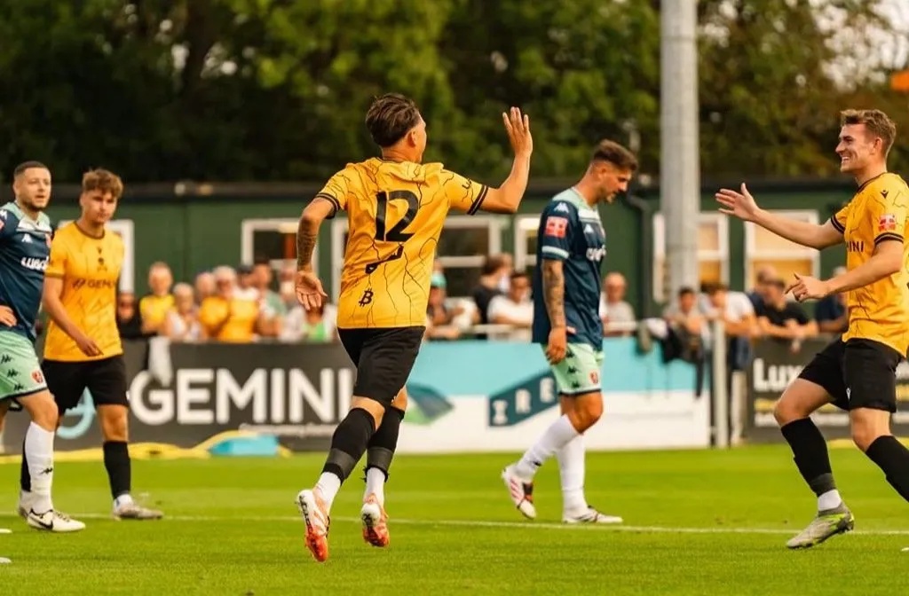 Real Bedford striker, Tom Hitchcock celebrates a goal with Elliot Simmons at the Ledger Stadium