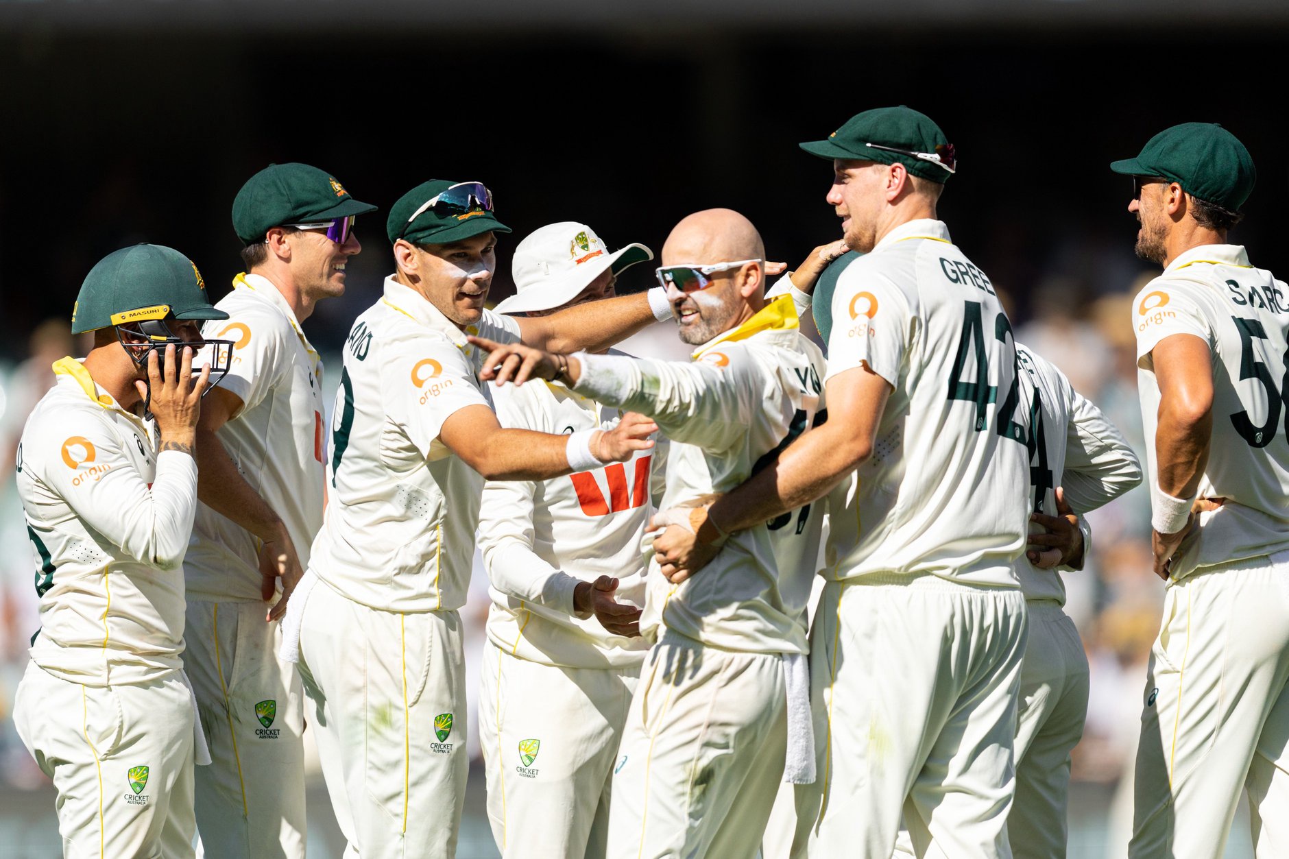 Nathan Lyon of Australia is congratulated by his team mates after taking a wicket during day four of the Third Test Match in the 2025/26 Ashes Series between Australia and England 