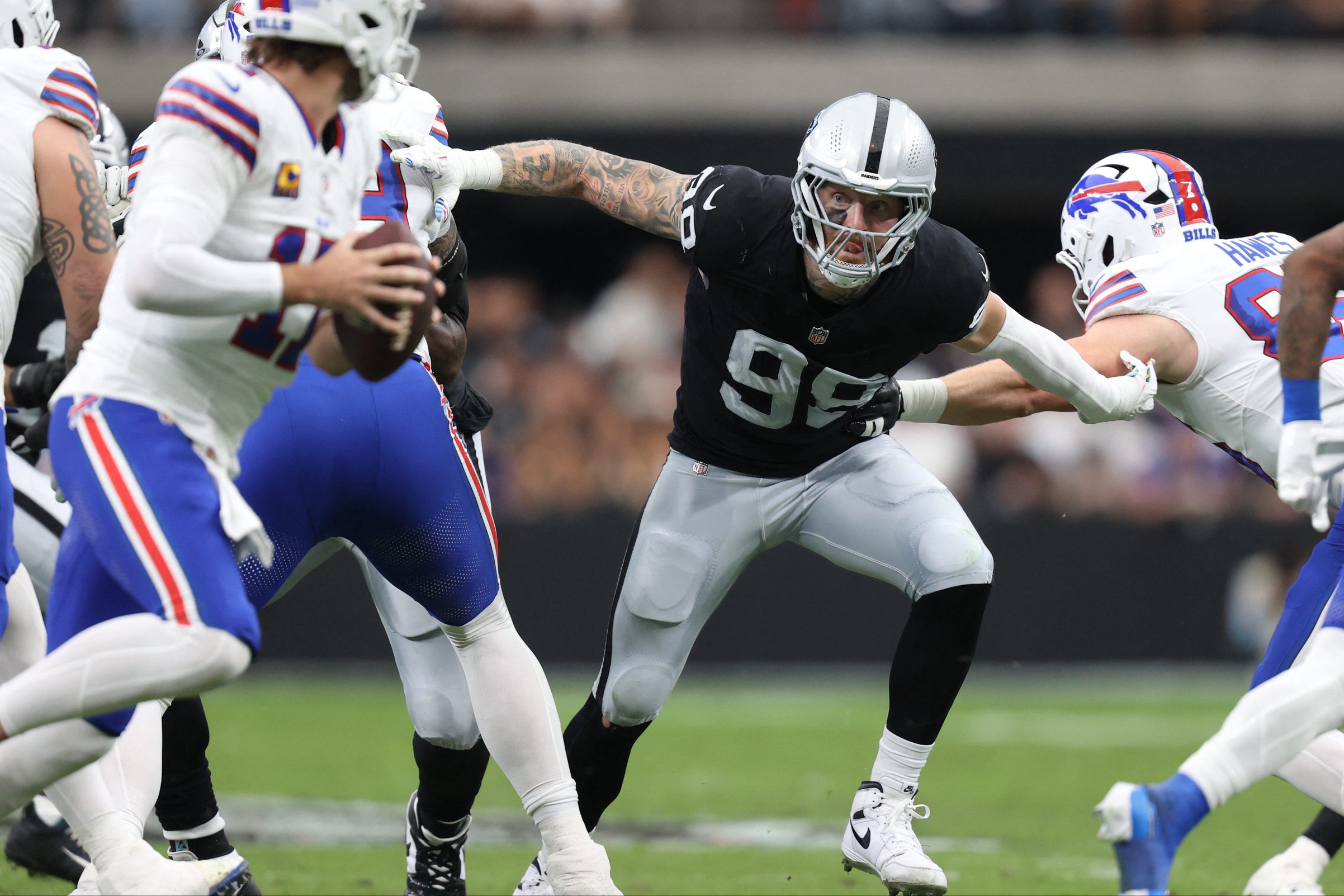 Oct 18, 2026; Paradise, Nevada, USA;  Las Vegas Raiders defensive end Maxx Crosby (98) rushes the passer in the second quarter against the Buffalo Bills at Allegiant Stadium.  Mandatory Credit: Christopher Trim-Imagn Images