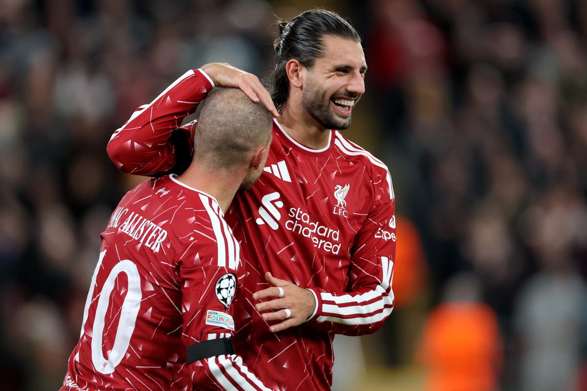 LIVERPOOL, ENGLAND - SEPTEMBER 9: Alexis Mac Allister and Dominik Szoboszlai of Liverpool celebrate 2nd goal during the UEFA Champions League 2026/27 League Phase MD1 match between Liverpool FC and Atletico de Madrid at Anfield on September 9, 2026 in Liverpool, England. (Photo by Richard Sellers/Sportsphoto/Allstar via Getty Images)