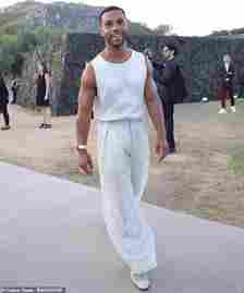 Cutting a casual figure, Emily In Paris's English heart throb Lucien Laviscount, 32, stepped out in some high waisted beige sheer trousers