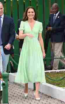 During her week-long royal tour of the Caribbean with Prince William in 2022, the Princess of Wales was seen arriving at a primary school in the Bahamas in a minty green capped-sleeve number. Cinched just above the waist and falling to Kate's favourite mid-calf hem length, she paired it with classic pumps from Jimmy Choo