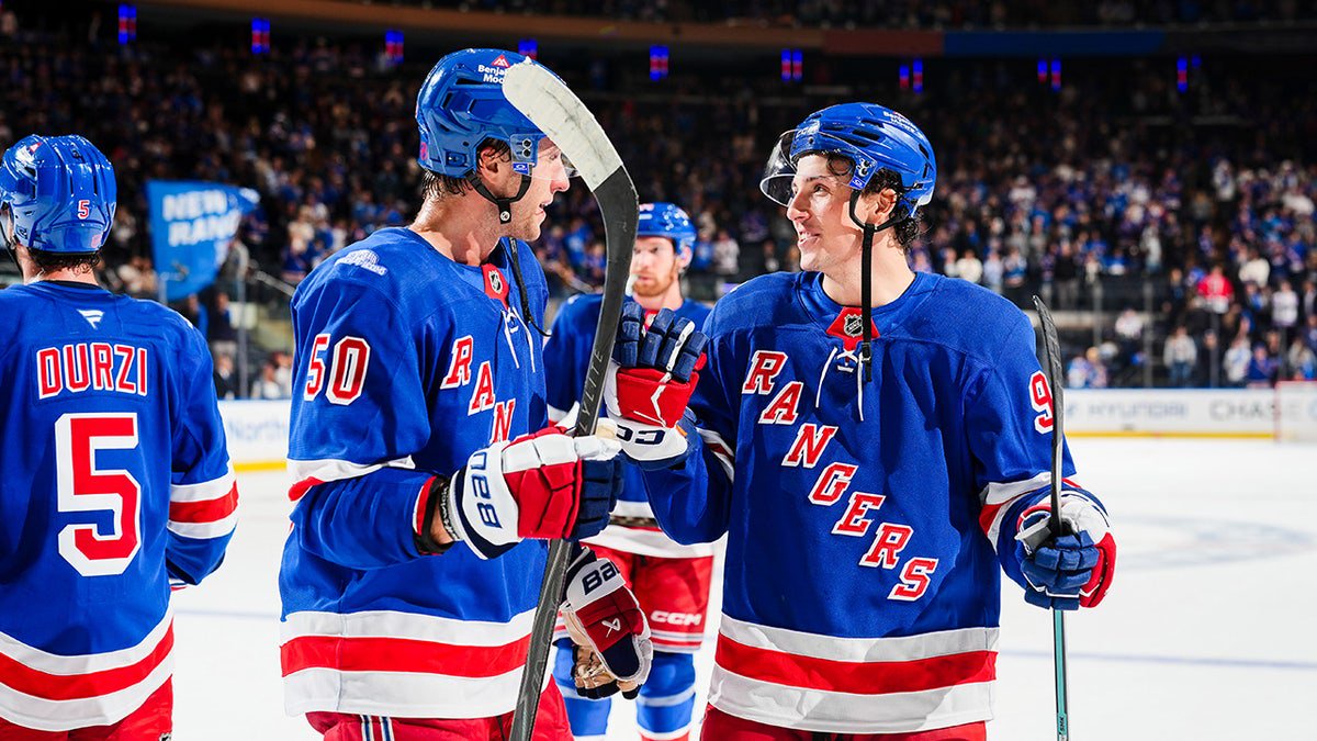 Will Cuylle #50 and Gabe Perreault #94 of the New York Rangers celebrate after the game against the Tampa Bay Lightning at Madison Square Garden on Oct. 1, 2026, in New York City.