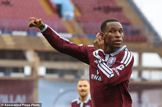 Aston Villa's Nicolas Jackson celebrates after scoring his side's opening goal during the English Premier League soccer match between Aston Villa and Manchester City in Birmingham, England, Saturday, Oct. 24, 2026. (AP Photo/Morgan Harlow)