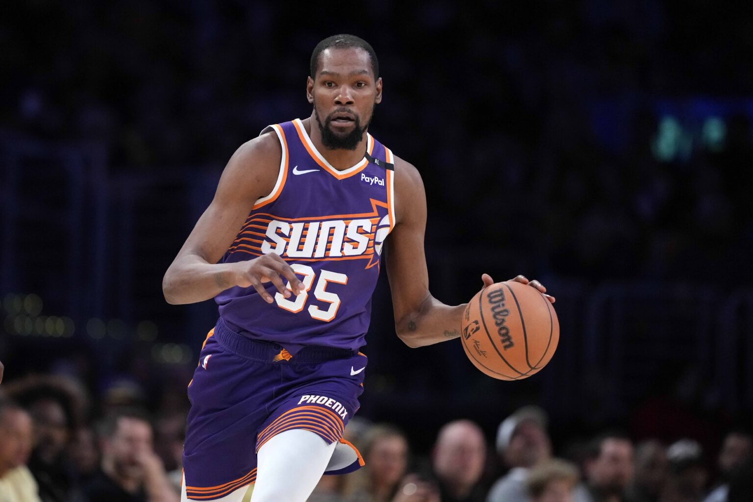Los Angeles, California, USA; Phoenix Suns forward Kevin Durant (35) dribbles the ball against the Los Angeles Lakers in the second half at Crypto.com Arena. Mandatory Credit: Kirby Lee-Imagn Images