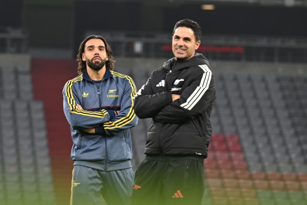 David Raya and Mikel Arteta at the Allianz Arena