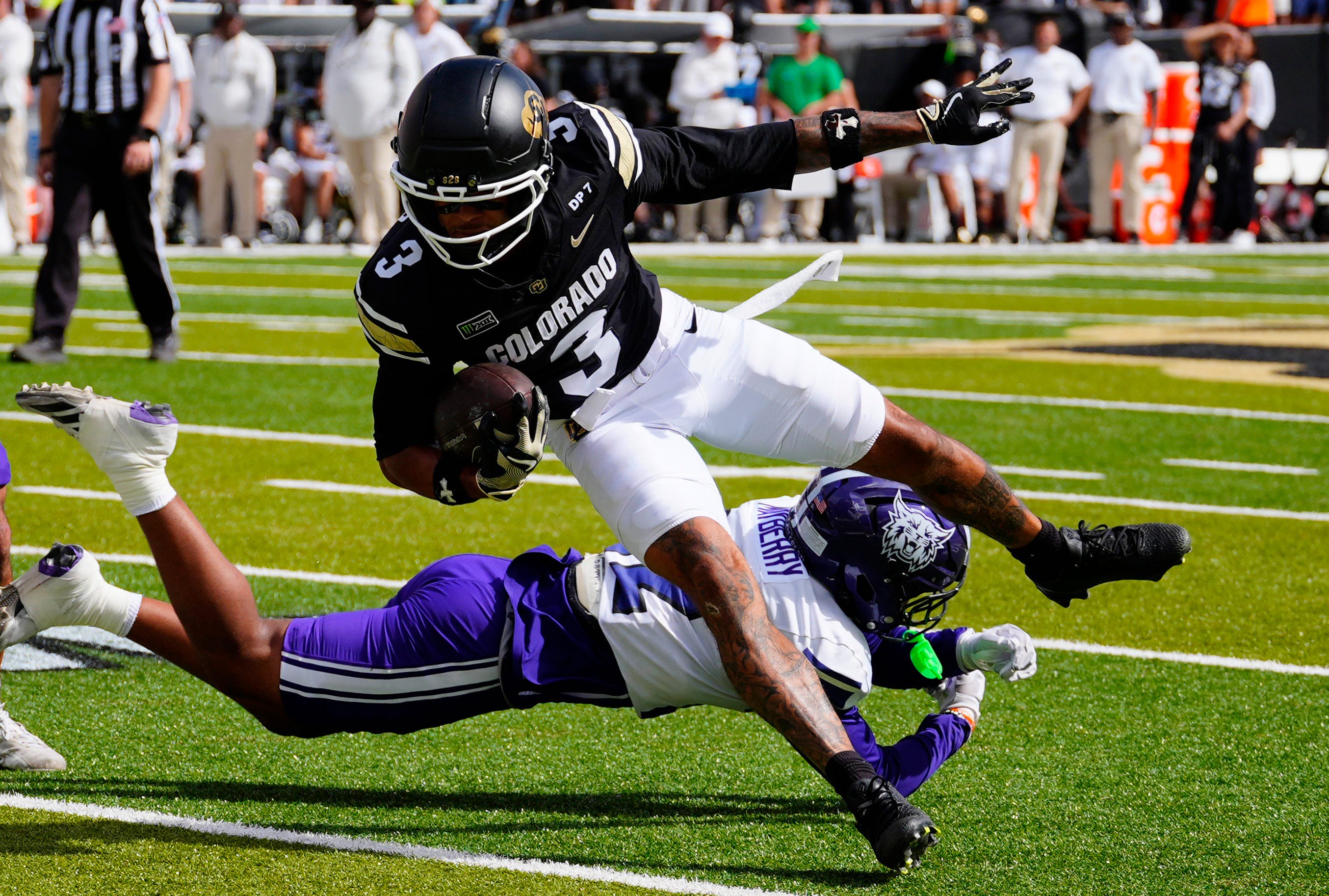Sep 12, 2026; Boulder, Colorado, USA;  Colorado Buffaloes wide receiver DeAndre Moore Jr. (3) runs with the ball during the second quarter against the Weber State Wildcats at Folsom Field.  Mandatory Credit: Ron Chenoy-Imagn Images