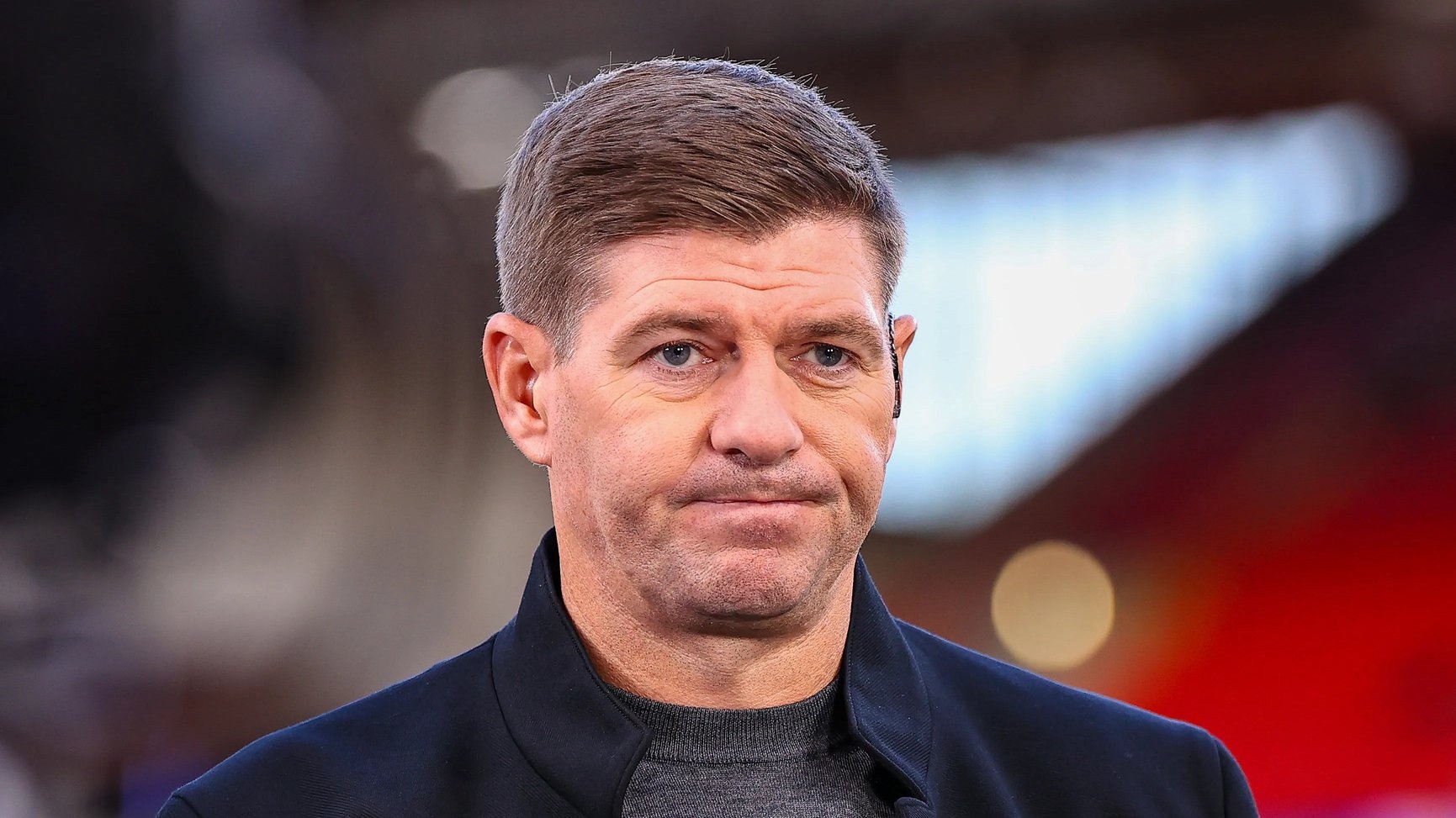 Steven Gerrard watches on as a pundit
