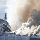Fire ravages 17th-century Old Stock Exchange in Copenhagen, toppling the iconic spire
