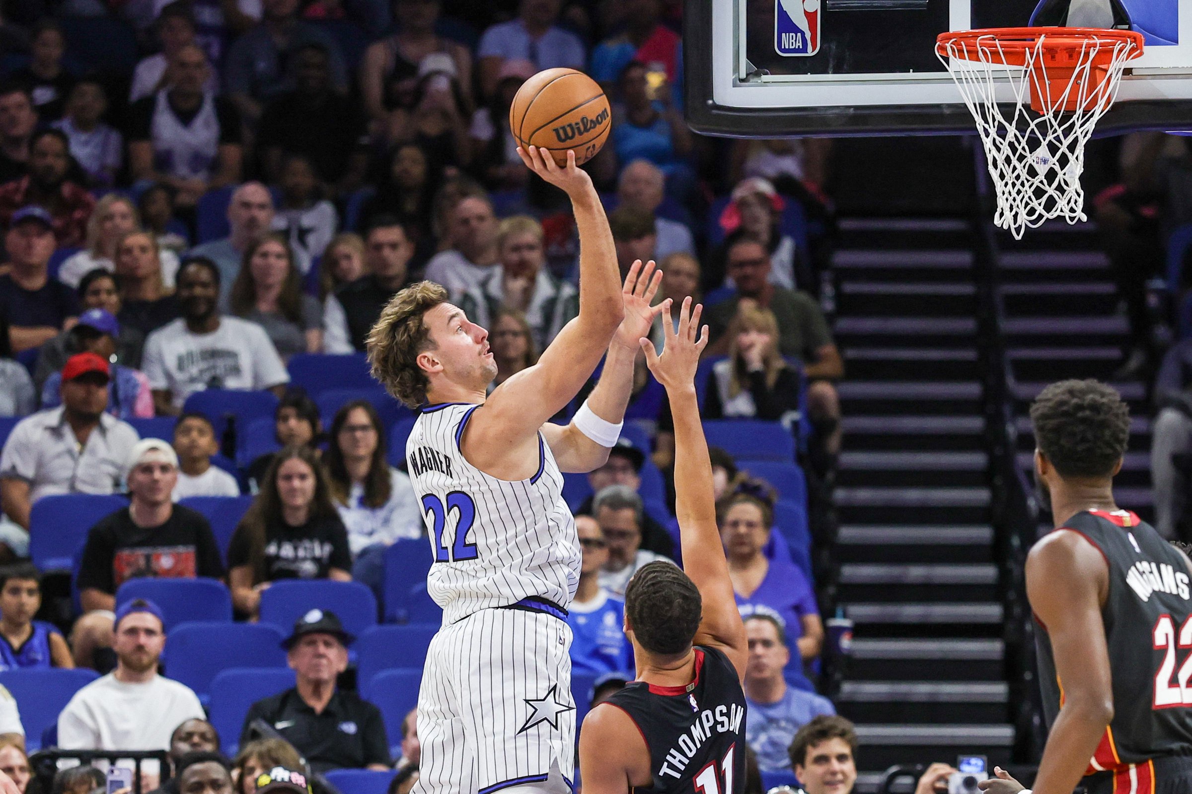 Oct 16, 2026; Orlando, Florida, USA;  Orlando Magic forward Franz Wagner (22) goes to the basket against Miami Heat guard-forward Klay Thompson (11) during the first quarter at Kia Center.  Mandatory Credit: Mike Watters-Imagn Images
