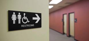 EEOC says workplace bias laws cover bathrooms, pronouns and abortion