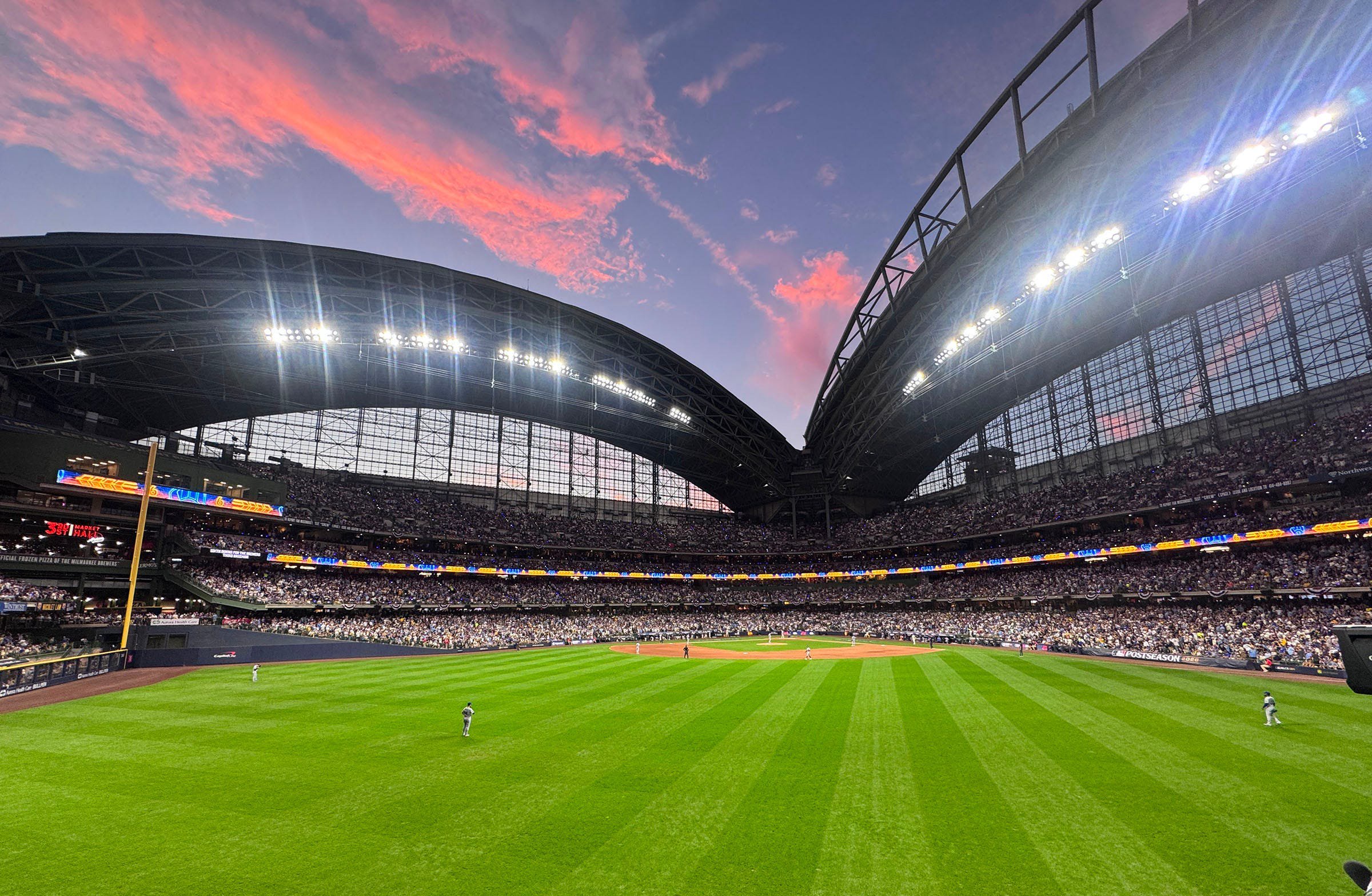 The sun sets over American Family Field.