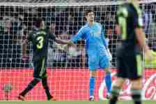 (L-R) Eder Militao of Real Madrid, Thibaut Courtois of Real Madrid  during the La Liga EA Sports  match between Real Sociedad v Real Madrid at the ...