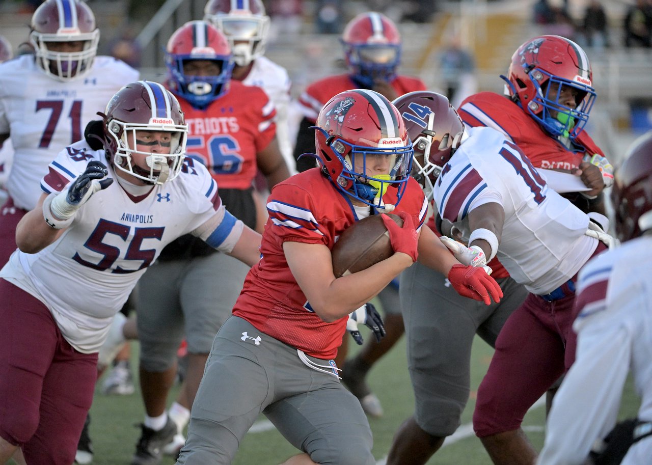 Old Mill Patriots Tyler McConville #22 runs in the first quarter. The Annapolis Panthers host the visiting Old Mill Patriots in a high school football held at Severna Park High School Friday evening. (Paul W. Gillespie/Staff)