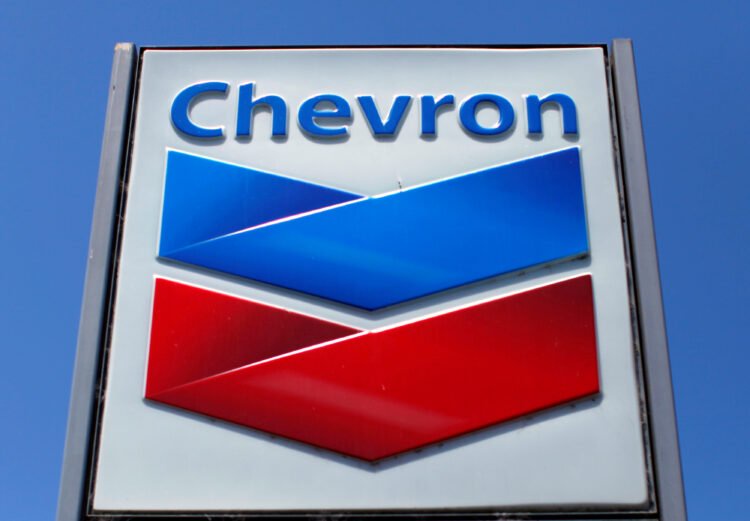 FILE PHOTO: A Chevron gas station sign is seen in Del Mar, California, April 25, 2013. Chevron will report earnings on April 26. REUTERS/Mike Blake/File Photo/File Photo