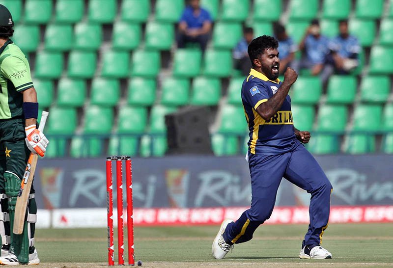 Pakistani batsman Maaz Sadaqat batter plays a shot during the ODI tri-series cricket match against Sri Lanka at Gaddafi Stadium.