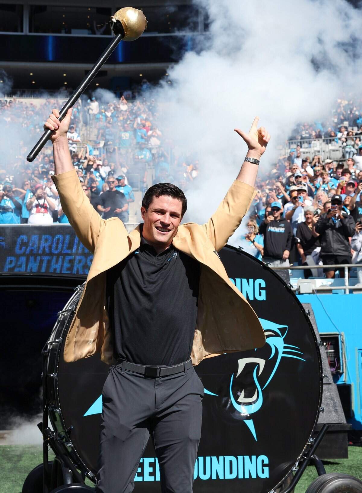 Former Carolina Panthers linebacker Luke Kuechly acknowledges the cheers of the fans after hitting the Keep Pounding drum prior to the team’s game against the Tampa Bay Buccaneers at Bank of America Stadium in Charlotte, NC on Sunday, October 25, 2026.