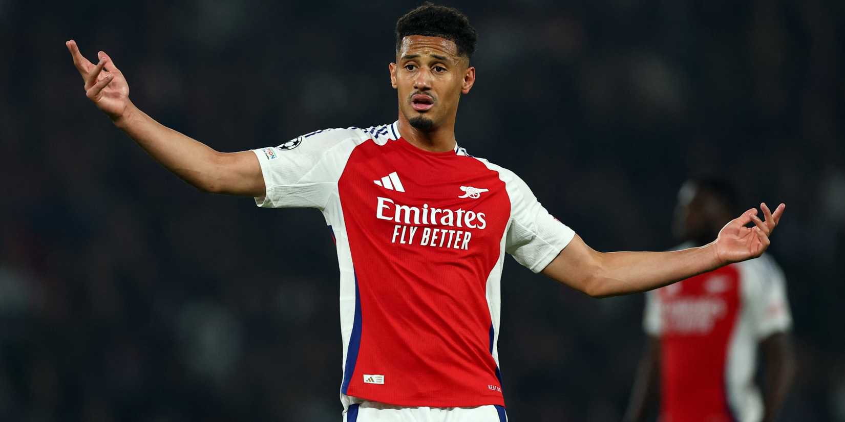 Arsenal defender William Saliba reacts during Champions League clash with Paris Saint-Germain