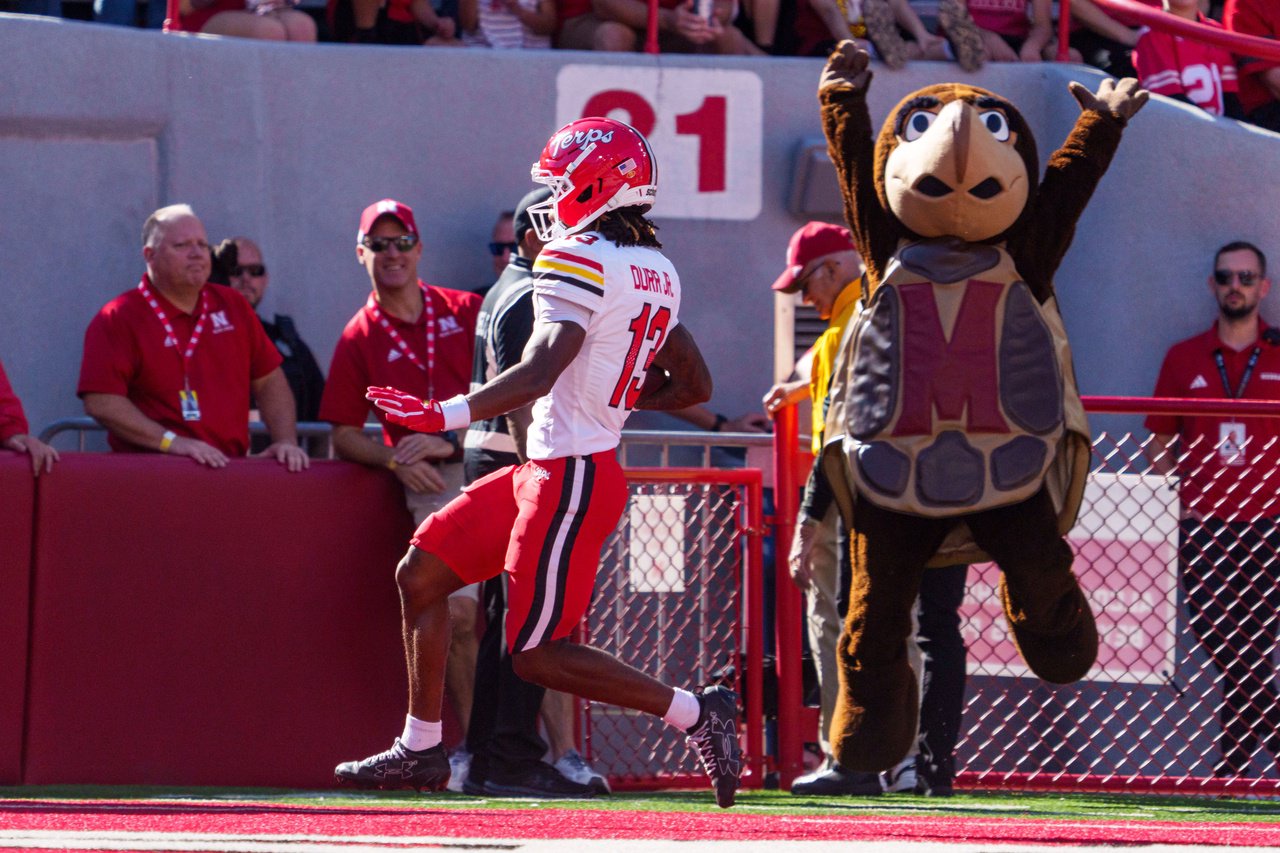 Oct 3, 2026; Lincoln, Nebraska, USA;  Maryland Terrapins wide receiver Chris Durr Jr. (13) scores a touchdown against the Nebraska Cornhuskers during the first quarter at Memorial Stadium.  Mandatory Credit: Dylan Widger-Imagn Images