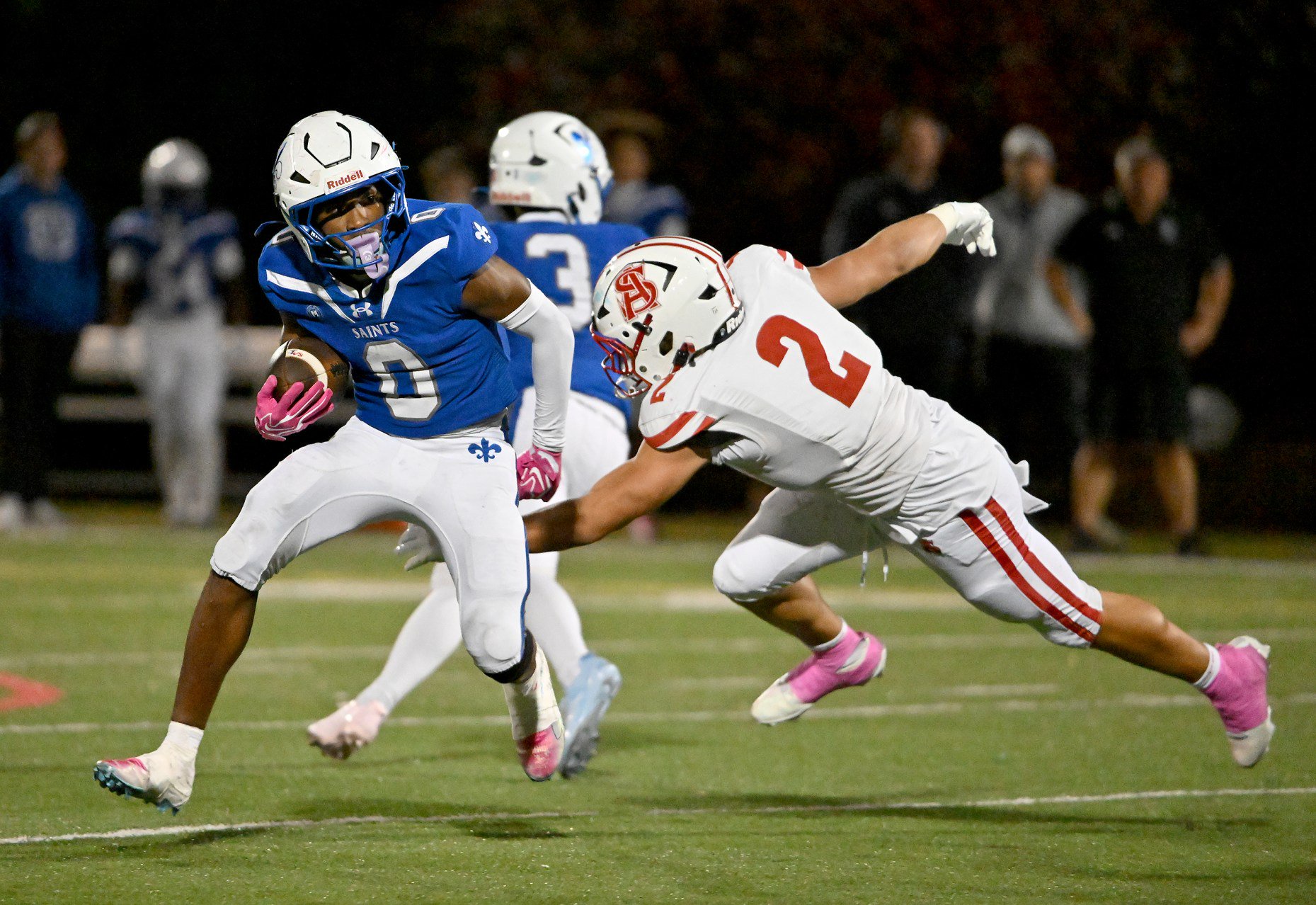 St. Mary's Saints Karter Pack #0 has a big run by Archbishop Spalding Cavaliers Jonah Lewis #2 during the second quarter. The Archbishop Spalding Cavaliers visit the St. Mary's Saints in a high school football matchup Friday evening. (Paul W. Gillespie/Staff)