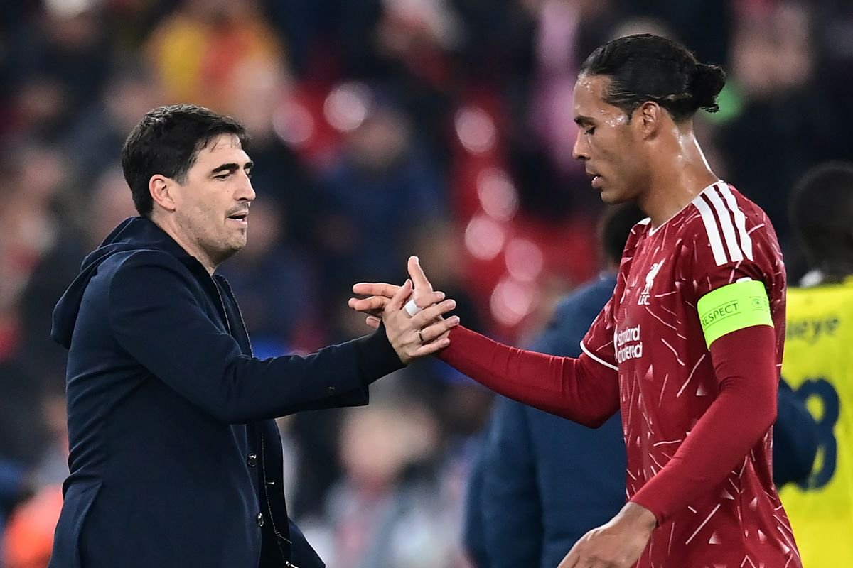 Liverpool head coach Andoni Iraola with captain Virgil van Dijk after the UEFA Champions League match against Villarreal CF at Anfield on October 20 2026